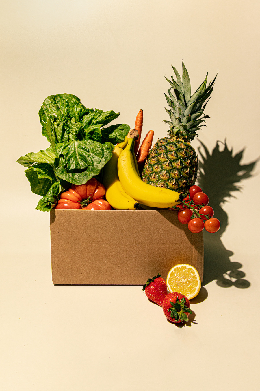 Cardboard Box with Vegetables and Fruits
